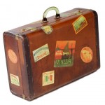 Vintage luggage - Vintage suitcase covered in stickers