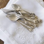 Linen napkins with silver cutlery