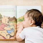 a luscious childhood - Cute kids - baby with Winnie the Pooh book