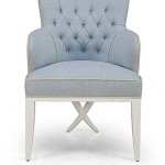 Armchair in pale blue with buttons