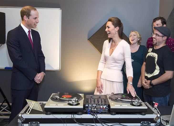 ROYAL, er, DJ STYLE: Kate Middleton in a soft pink long-sleeved Alexander McQueen top with v-neck and peplum detailing and a pleated A-line skirt
